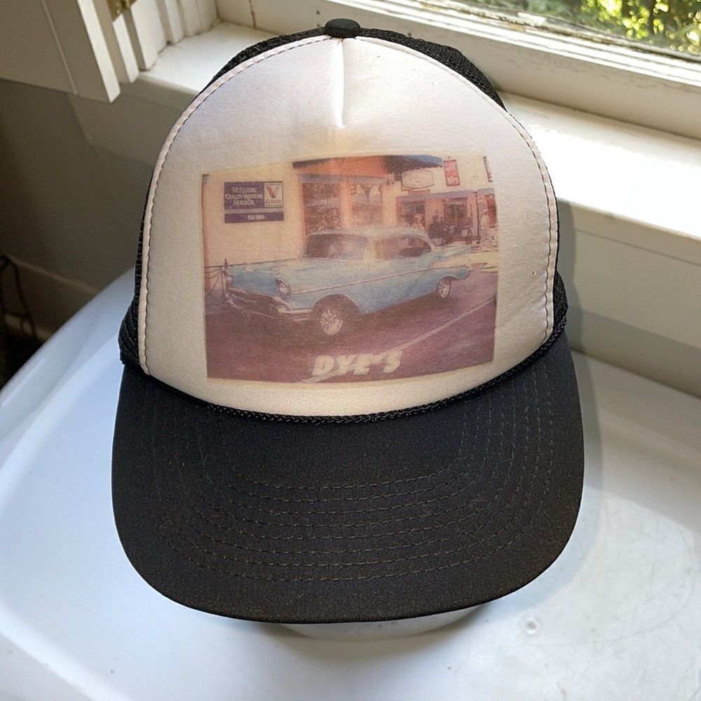 Vintage black‎ & white trucker hat with picture of Dye’s blue ‘57 Chevy on it